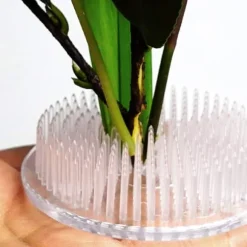 4 blomsterformede blomsterarrangementer i klar plastik, 70 mm