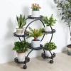 Blomsterstander - Plantehylde med 4 hjul - 6 niveauer - Metal - Samling påkrævet - Str. L - Sort
