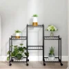 Blomsterstativ med hjul - Robust plantehylde i jern | Farve: Sort | Størrelse: 83x25x63,5 cm