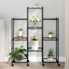 Blomsterstativ med hjul i jern - Plantehylde | Farve: Sort | Størrelse: 83x25x103,5 cm