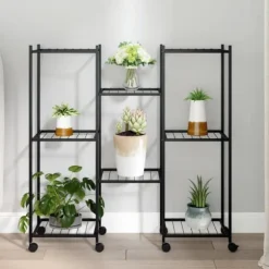 Blomsterstativ med hjul 83x25x83,5 cm jern sort - Blomsterstativ - Blomsterstativer - Home & Living