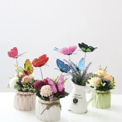 OBOSOE 50-Pack aftagelig 3D sommerfugl havedekoration – vandtæt PVC blomsterpind ornamenter til udendørs brug